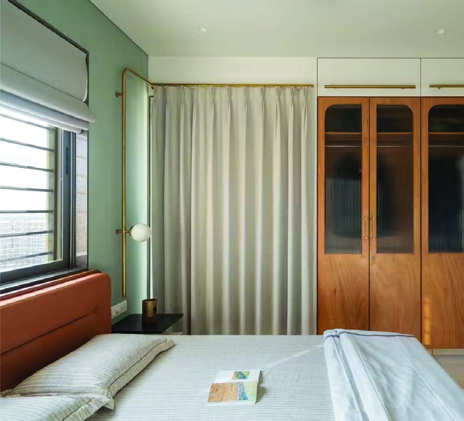 I like the idea of curtains covering wardrobes